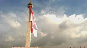 Hari Bela Negara - Ade Rai Pimpin Upacara, Bendera Merah Putih Terbesar Dikibarkan di Monas