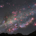 star birth  glowing pink clouds of hydrogen gas 