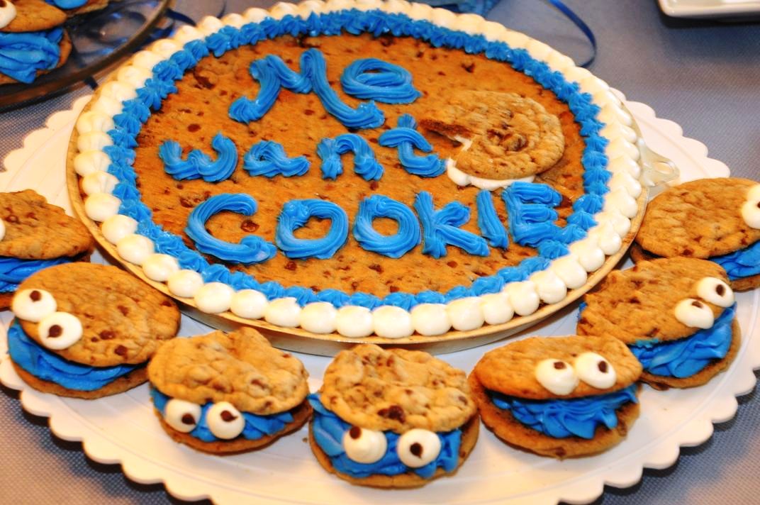 made this cookie monster cookie cake and cookie monster cookies .