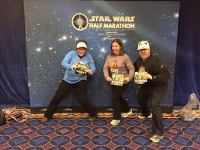 My husband, sister-in-law, and me before the runDisney Star Wars half marathon