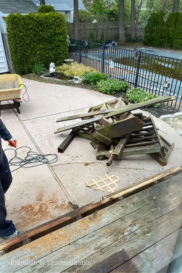 Old wooden deck in pieces on patio