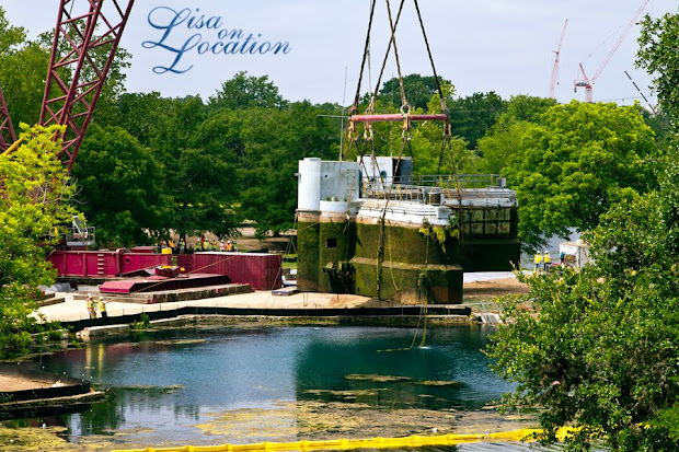 The 400-ton Submarine Theater is lifted out of Spring Lake at Aquarena Center, Texas State University-San Marcos. Photo by Lisa On Location photography.