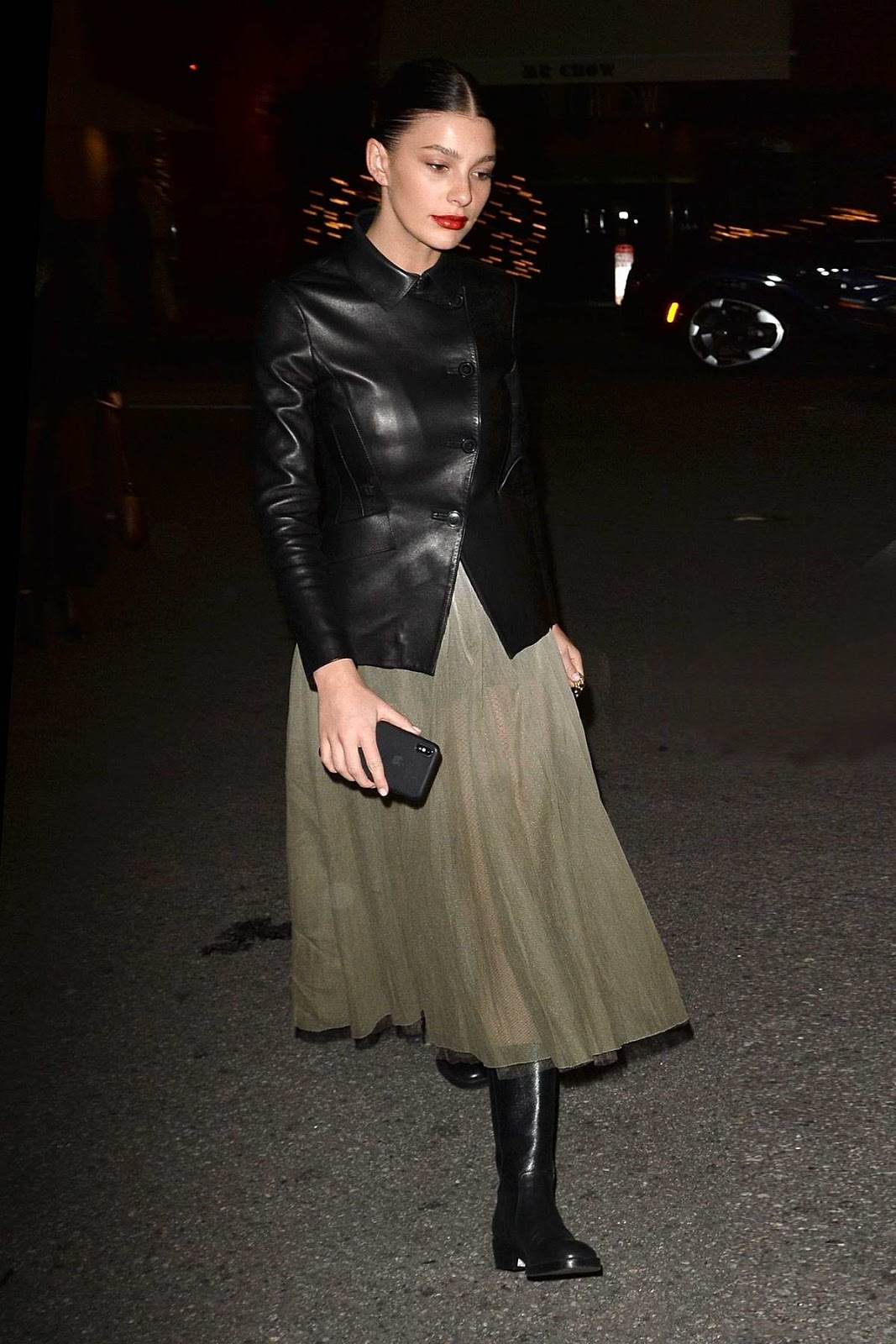 Camila Morrone night out style in black leather jacket