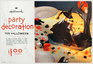 Hallmark Party Decoration from late 1950's features an eerie witch stirring her cauldron near an old tree where an owl perches.