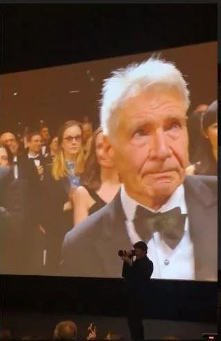 Harrison Ford cried after the world premiere of his movie "Indiana Jones: Dial of Destiny" at the Cannes Film Festival International star Harrison Ford cried after the world premiere of the fifth part of his adventure series "Indiana Jones", titled "Indiana Jones: Dial of Destiny", which was held in the early hours of Friday morning on the sidelines of the Cannes Film Festival.    The Hollywood Reporter posted a video on its official page on Instagram after the end of the special screening of the film, during which Ford appeared crying due to the warm reactions of the audience, and it was clear that he was affected, and the audience continued to applaud Ford for a full 5 minutes. The film is the final appearance of "Harrison Ford" in the series, which began starring since its first part in 1981.