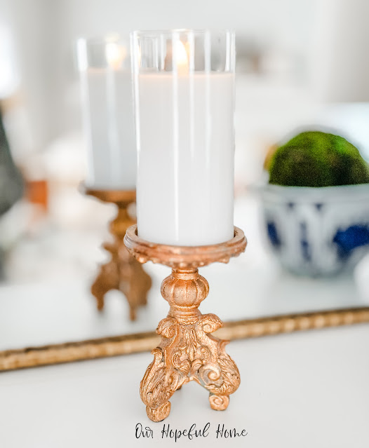 candle holder on mantel with LED pillar candle