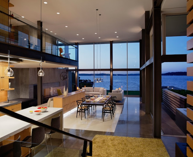 Picture of modern kitchen and dining room overlooking the sea as seen from the staircase