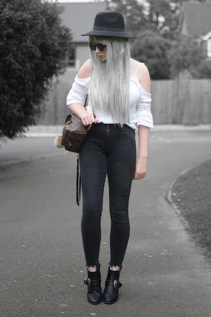 Sammi Jackson - Primark Black Fedora / Zaful Sunglasses / Boohoo Off Shoulder Top / Louis Vuitton Palm Springs Mini Backpack / Primark Ripped Jeans / MIssguided Buckled Ankle Boots 
