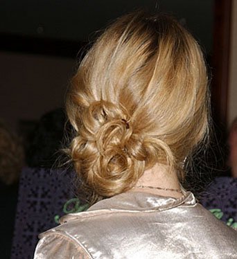 low side bun hairstyles. Messy side buns.