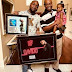 See Davido presenting his plaque to his Cute Father