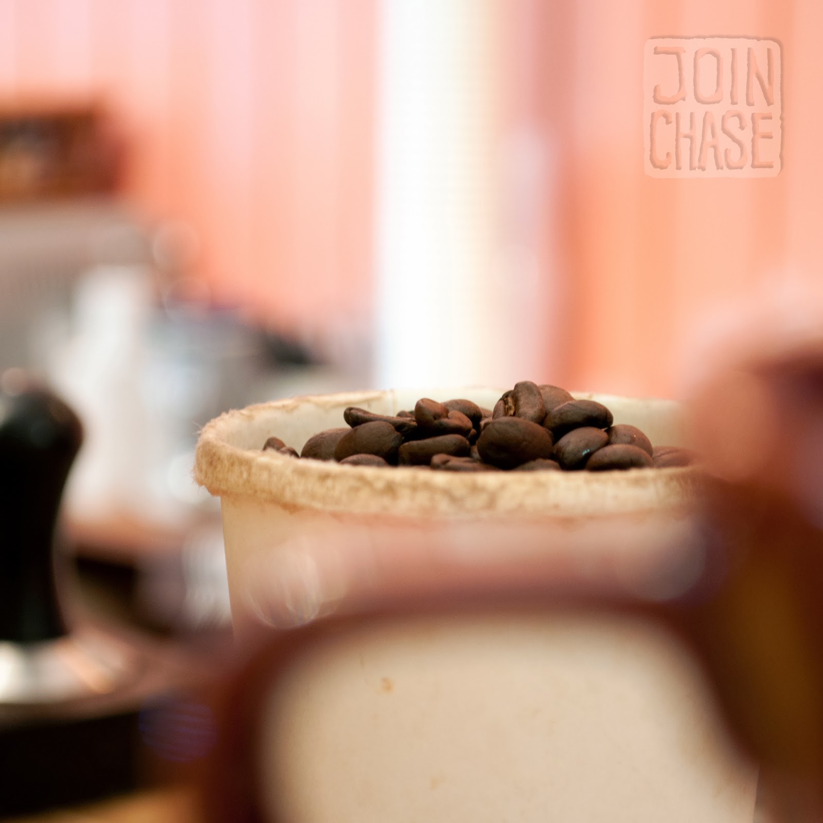 A cup of freshly roasted beans ready to be ground up and served in a delicious latte from "Coffee by Daniel" in Ochang, South Korea.