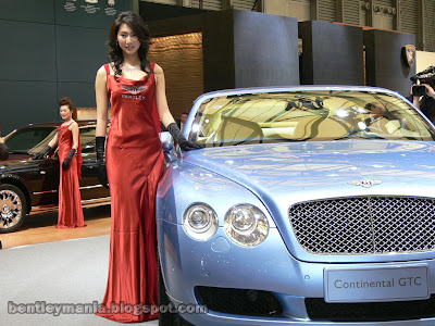 Sexy Asian Bentley Girl posing with Bentley Continental GTC