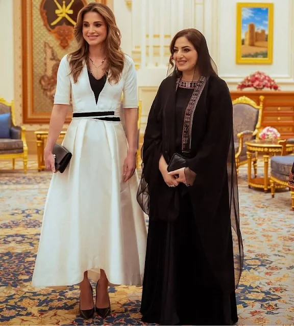 Queen Rania wore a floral-embroidered polka-dot midi dress by Giambattista Valli. Johanna Ortiz Lucid top and midi skirt