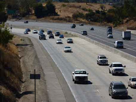 Cars driving down a highway