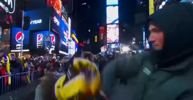 New Years Eve 2018 New york Time Square dancing purple yellow hat falling off