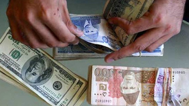Pak rupee devalued by US Dollar