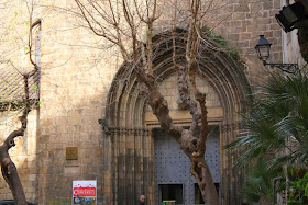 Gothic doorway of Santa Anna church inside the Barcelona Gothic Quarter