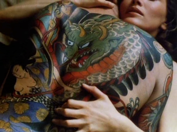 lingering shots of Dern staring in awe at tattooed Asian men in thongs