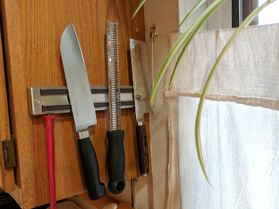 Magnetic Knife Rack with knives and utensils