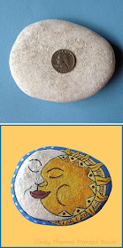 Moon and Sun Faces painted on a rock by Cindy Thomas