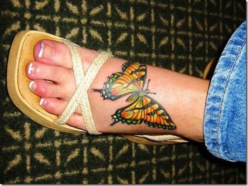 joli_papillon_de_tatouage_sur_le_pied