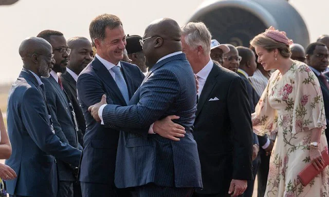 Queen Mathilde wore a floral print silk chiffon midi dress by Giambattista Valli. Denise Nyakeru Tshisekedi