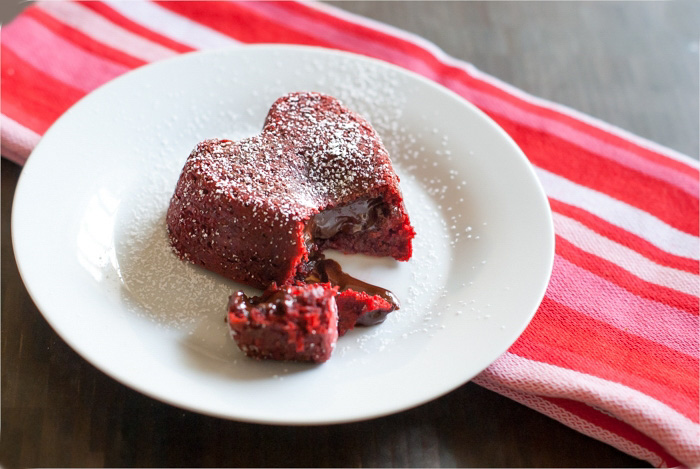 Heart-Shaped Red Velvet LAVA Cakes, with center oozing out onto plate