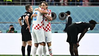 Players of Croatia celebrate their 4-1 victory over Canada in the FIFA World Cup 2022 match at the Khalifa International Stadium in Qatar