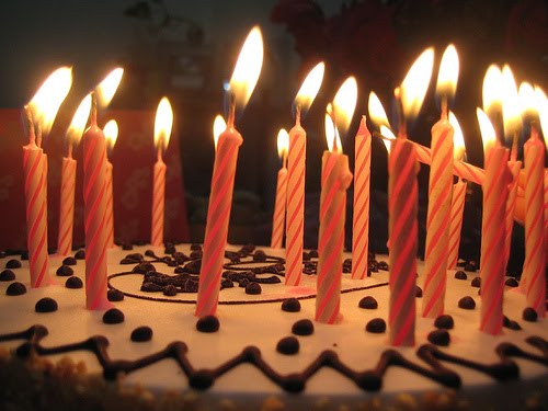 Lots of candles birthday cake by dee m @ flickr