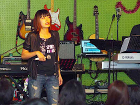 Aki performing on stage