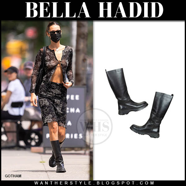 Bella Hadid in floral print top and skirt and black knee high boots