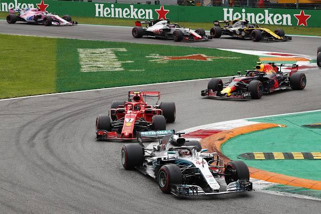 Lewis manage to overtake Kimi immediately whet the Safety Cars get home. On the next chicane, Kimi get back his P1. 