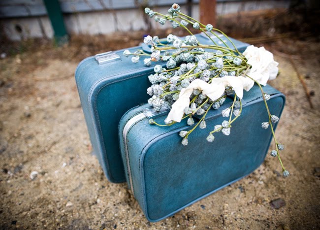 blue suitcases wedding flowers