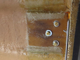 bolts through a fiberglass trailer wall