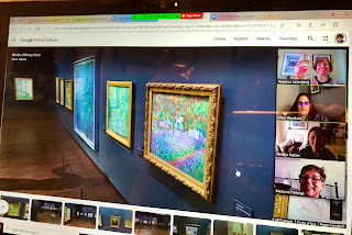 Screen shot of a virtual museum tour with paintings along the wall and four friends from a Zoom meeting down the right side of the screen.