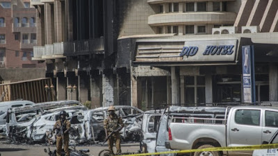 Soldiers are seen outside the Splendid Hotel in Ouagadougou.