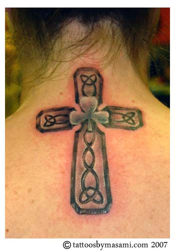 small neck tattoos. small cross tattoos. small