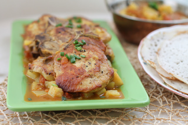 Food Lust People Lust: In this Indian-Spiced Pork Chop Potato Skillet you cook the chops till tender in a spicy tomato-onion sauce. Add potatoes and you have a full meal in one pan.