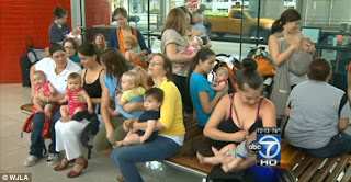 Airport Nurse-In: Breastfeeding moms stage 'Nurse In' at American Airlines ticketing counter in protest at mom 'harassed' by flight attendant as she fed her baby