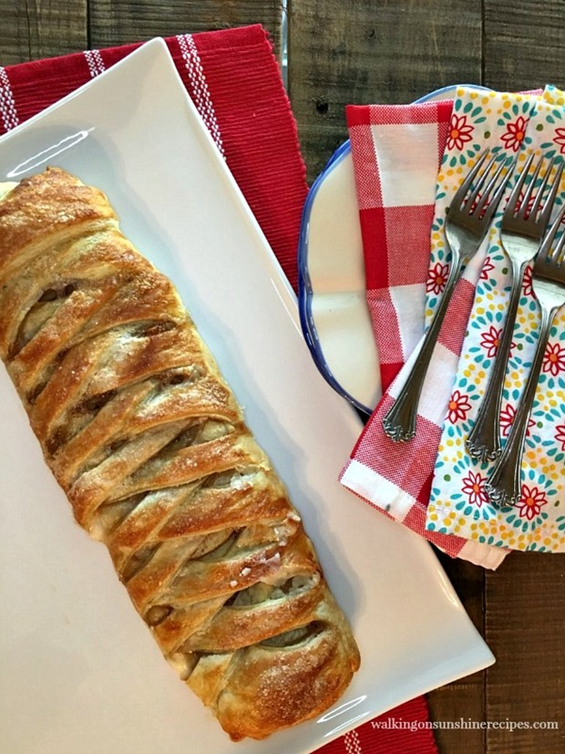 AppleCreamCheeseBraidonwhiteplatterwithnapkinsandforksfromWalkingonSunshineRecipes-2