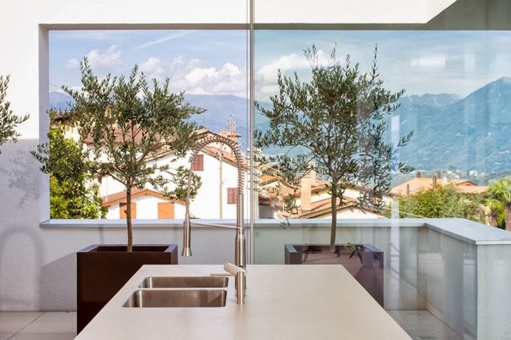 Kitchen view in Beautiful House Lombardo by Philipp Architekten