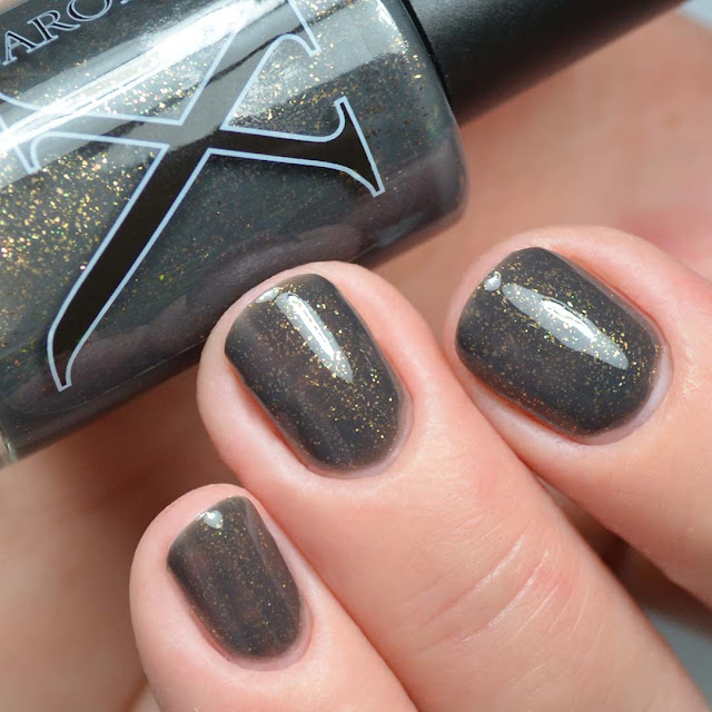 grey nail polish with bronze flecks swatch