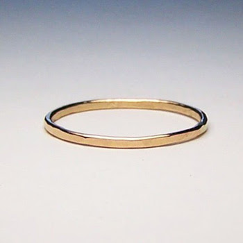 Recently I 39ve seen a few women wearing simple gold wedding rings by 