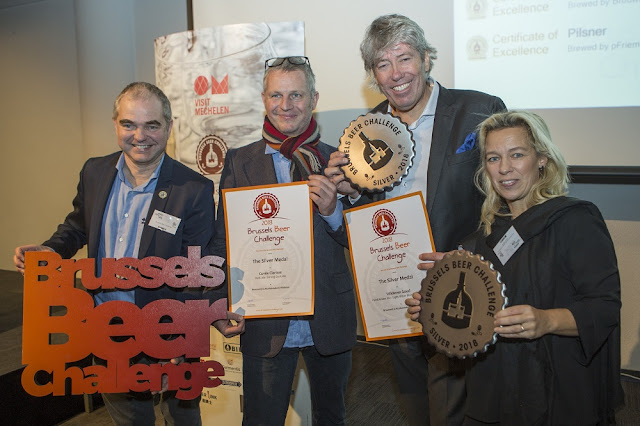 After a successful event in Mechelen last year, the world-renowned contest goes to Hainaut, the Province where Belgian beers are best represented (around 40 breweries, in which the oldest is in operation since 1769!) The competition will be held in the city of Mons from 1 November to 3 November 2019 for its eighth year of existence. Famous for its history, rich folklore and cultural life, Mons is also a lively city due to the numerous events held year-long and the large number of students learning in its universities. Such a vibrant city makes for the perfect setting to host Belgium’s leading beer-centric event. The Brussels Beer Challenge maintains the same goals: allowing brewers to put their products into the spotlight with the help of a recognized seal of quality. A selection of professional tasters from all around the world will evaluate the quality and specificities of the multiple beers in competition. Several beer professionals among whom beer writers, teachers, sommeliers and certified zythologists will be part of that remarkable jury. Gold, silver or bronze medal will reward the best bottles of each category: a prestigious symbol to the very best of the industry, along with an important marketing tool for brewers willing to prove the exceptional nature of their products. While popular styles like Tripels and IPAs are still the backbone of the competition, they are joined by plenty of new and creative beer types. Countries with a rich brewing heritage are sharing the position with promising new actors, enthusiasts about experimenting with new techniques and forgotten recipes alike. An international event by essence, more than 50 countries sent more than 1500 beers. The challenge is a testimony of that evolution, offering a worldwide visibility to the awarded beverages. More than a guide towards the finest beers, the contest aims to become the ambassador of a flourishing beer culture. Organised by Becomev (Beer Communication & Events), the Brussels Beer Challenge depicts the first competition of comparable proportions in Belgium. Multiple similar events have already  been held in other countries, to international acclaim, but Belgium’s relevance among the beer industry fully justifies the existence of such an exceptional, independent event. The results will be proclaimed at the Horeca Expo fair in Ghent: the opportunity for brewers to claim the various rewards obtained by the beer-candidates.