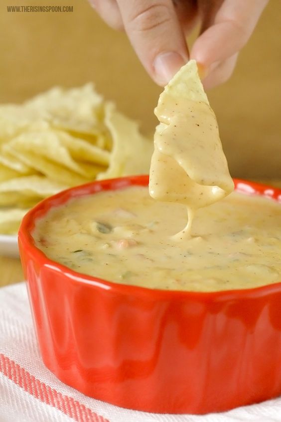 Homemade Queso Dip with Real Cheese! This easy recipe is made with three types of real cheese, onion, garlic, peppers, and spices in 30 minutes or less. Perfect for game day parties, holiday gatherings, or a relaxing night in! #sponsored #queso #cheese #cheesedip #dips #appetizers #homemade #easyrecipe #comfortfood #gameday #realfood #albertsons