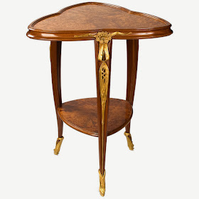 A French Art Nouveau table by Louis Majorelle in carved mahogany 