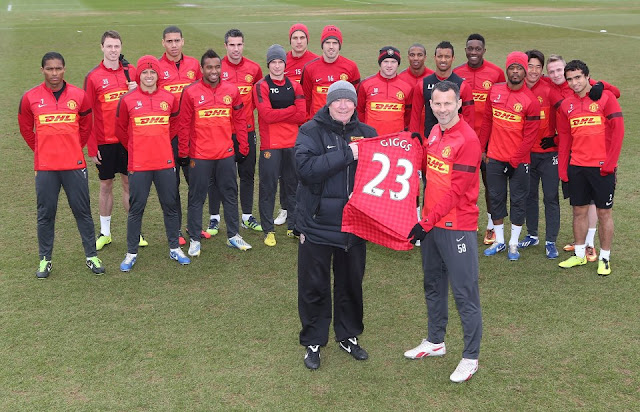Ryan Giggs gets a gift from the lads