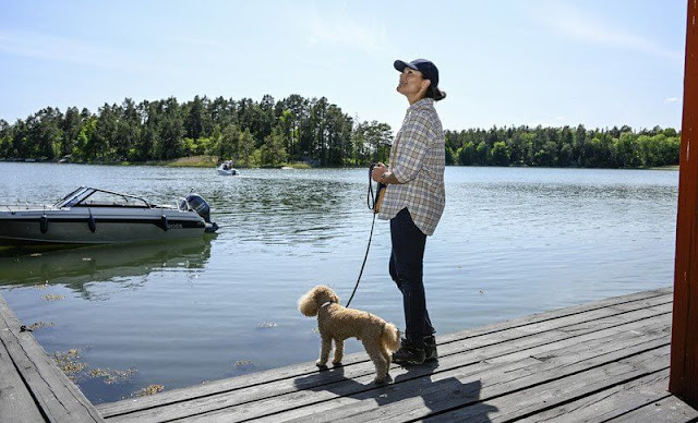 Crown Princess Victoria, with her dog Rio, visited Angso National Park. Victoria wore a checked shirt by Andiata