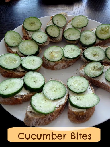 Cucumber Bites:  Crisp, fresh, cucumber slices on baguette spread with cheese.