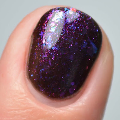 black jelly nail polish close up